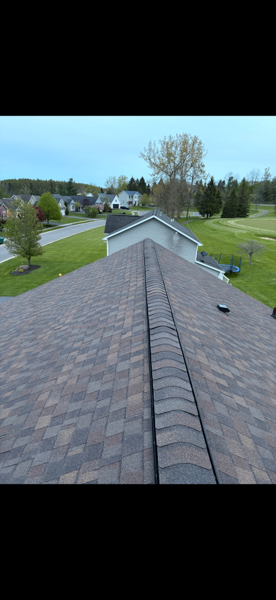 Finished ridge cap and roof surface